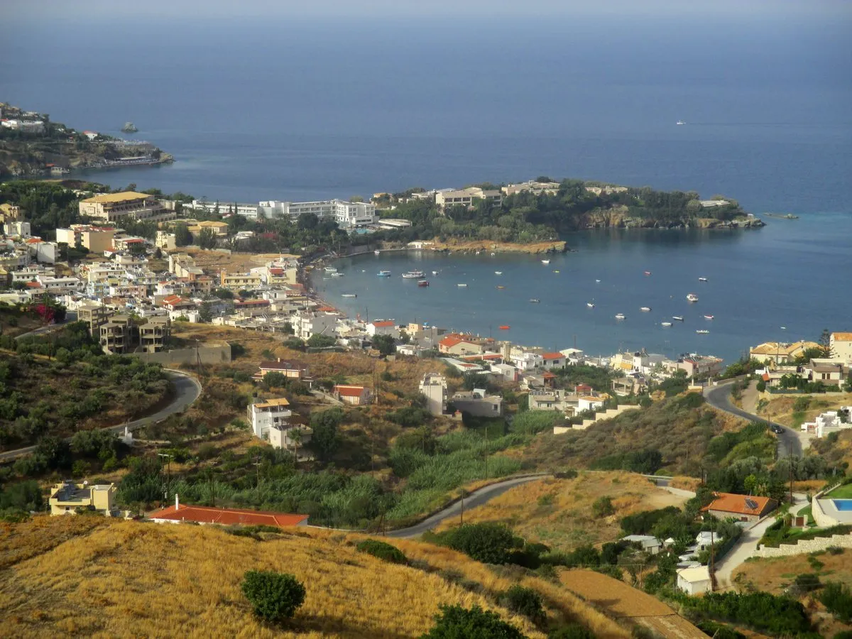 Agia Pelagia's bay and the headland that shelters it, seen from the hillside above