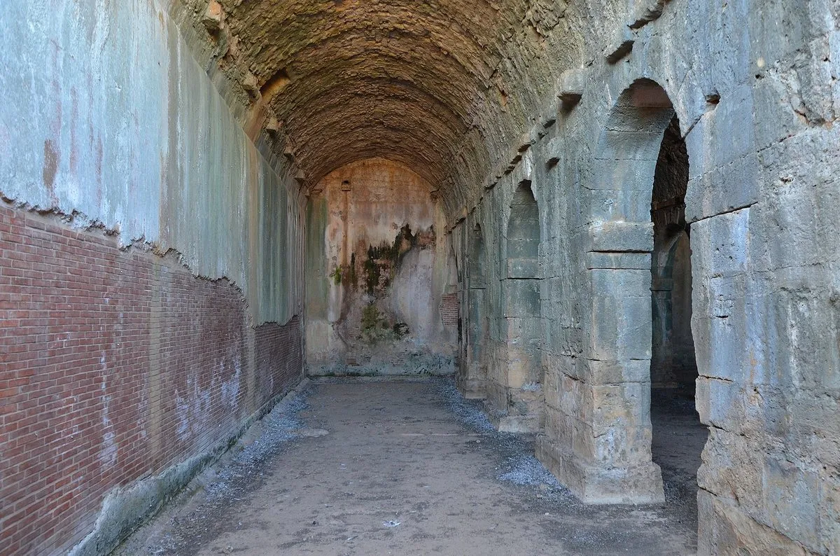 The vaulted Roman cistern at Aptera, three parallel barrel-vaulted chambers in dressed stone
