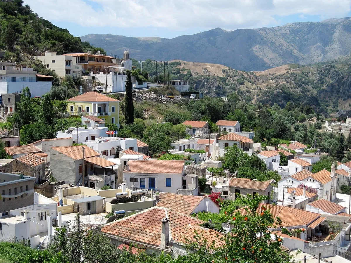 Houses and rooftops of upper Argyroupoli on its hillside