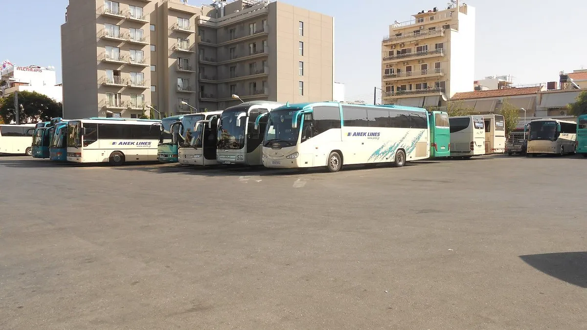 A line of KTEL intercity coaches parked at the central bus station in Chania