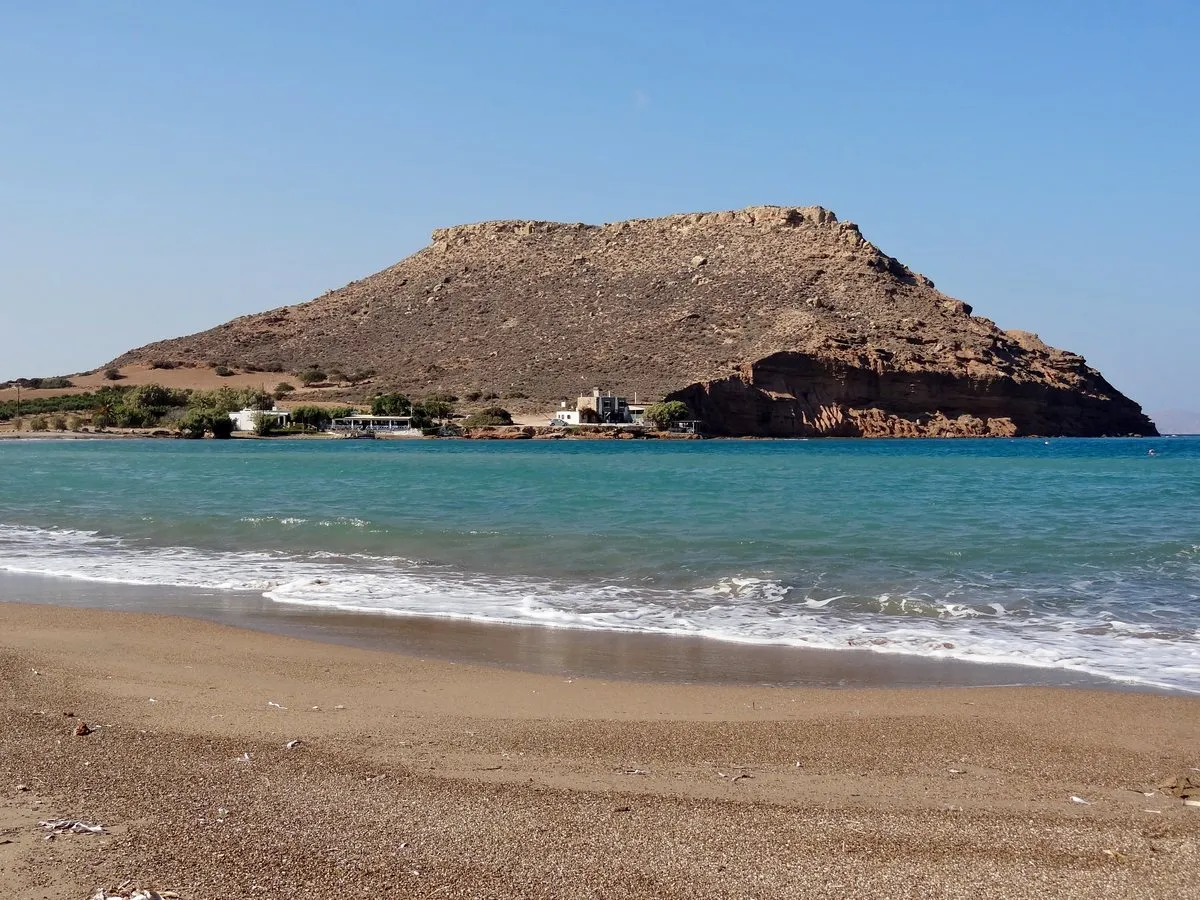 Chiona beach at Palekastro with the flat-topped Kastri headland behind it