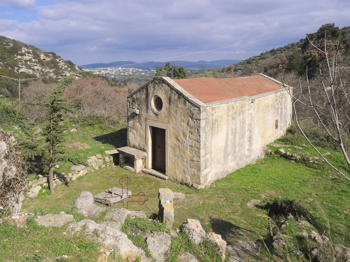 The stone chapel of Agios Nikolaos on its knoll outside Houdetsi