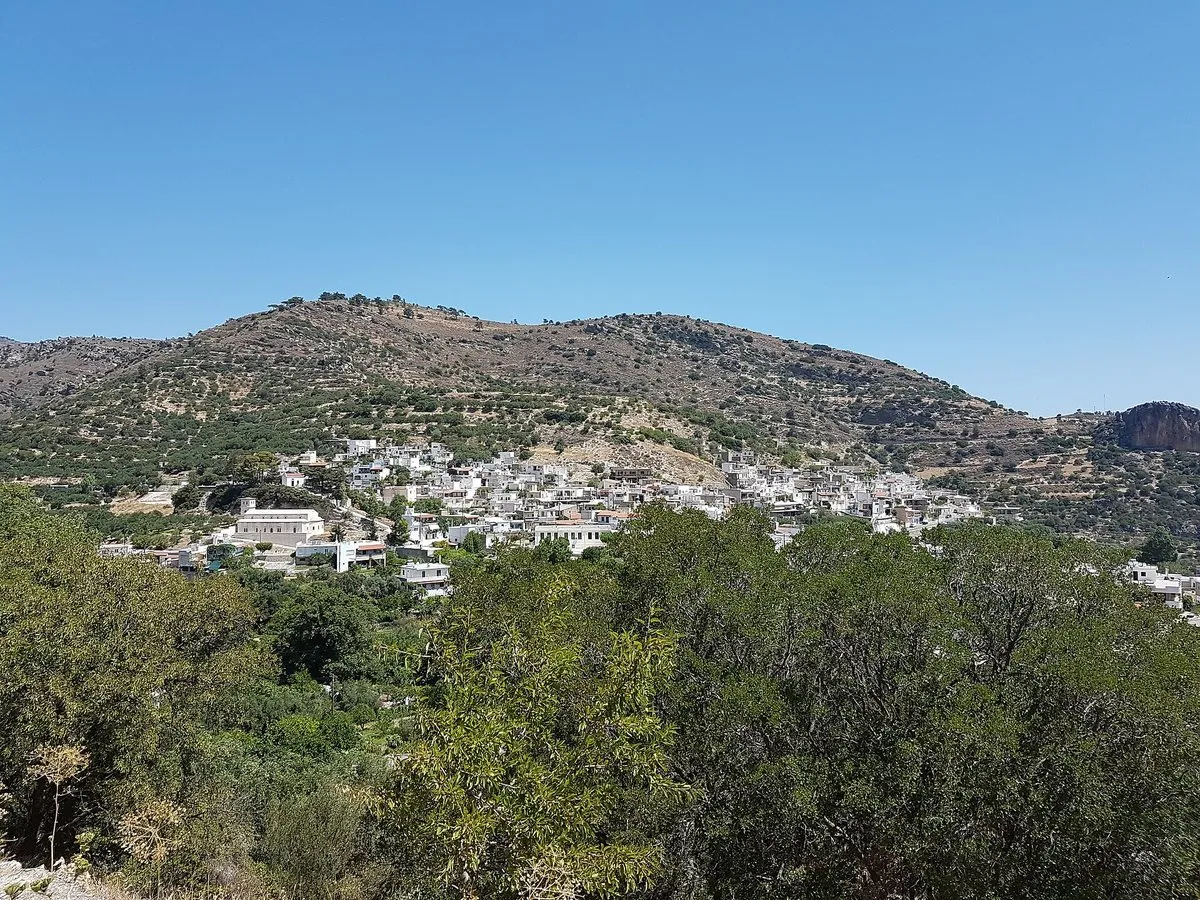 The village of Kalamafka spread below its limestone hill