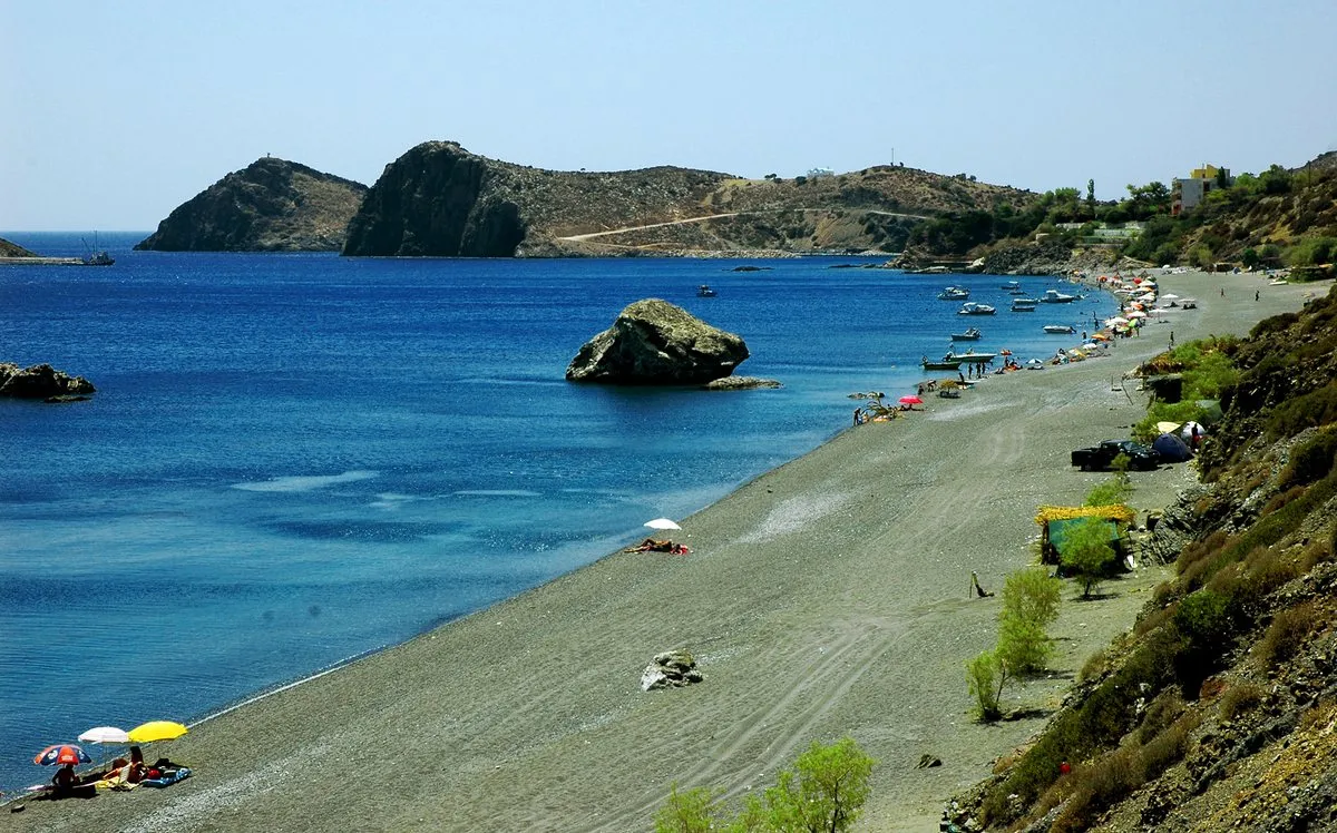 The beach with the fuel-depot islet offshore