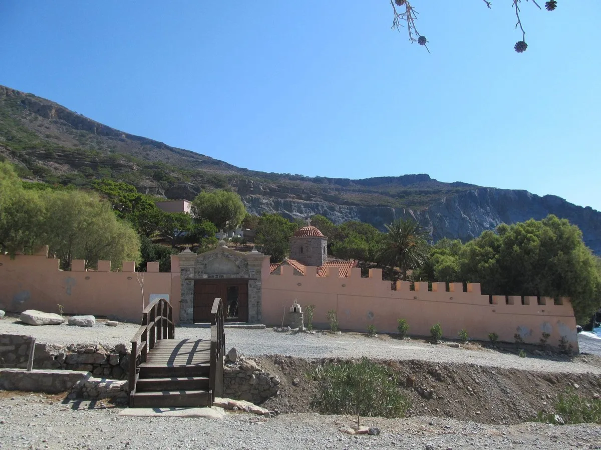The crenellated gate and wooden bridge at the entrance