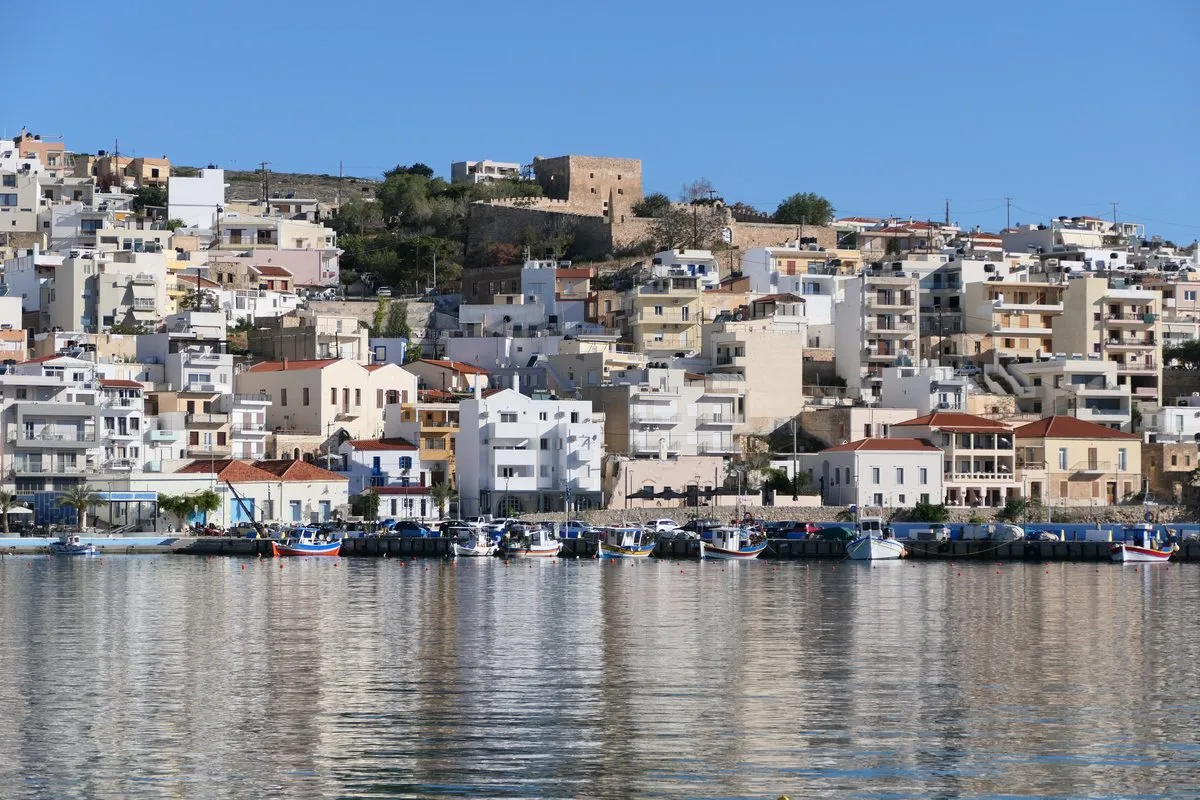 Sitia's harbour front with the Venetian Kazarma fort on the hill above it